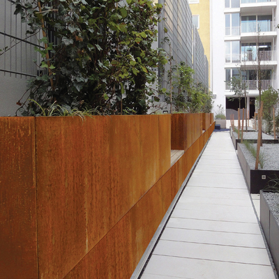 Packt rustikaler Metallstahlpflanzer Quadrat Corten Laser-Ausschnitt ein