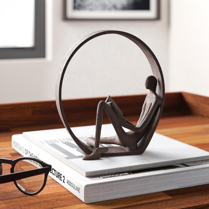 Betäubungsbirdsall umkreiste Leser-Iron Figurine Cast-Eisen-Skulptur